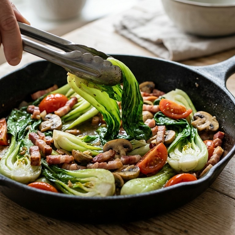 Paksoi met spek en tomaten recept