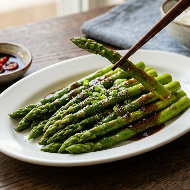 Groene Asperges in Oestersaus